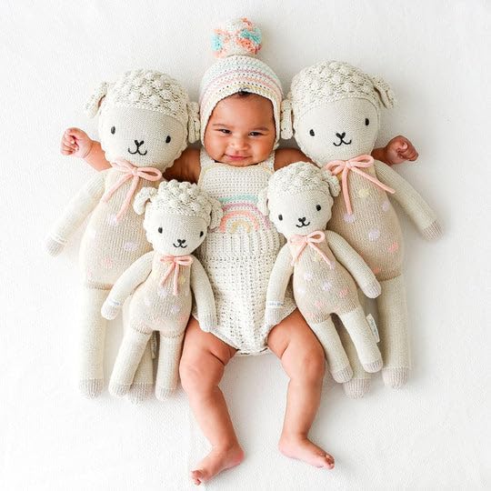 cuddle + kind Pastel Lucy The Lamb Regular 20" Hand-Knit Doll – 1 Doll = 10 Meals, Fair Trade, Heirloom Quality, Handcrafted in Peru, 100% Cotton Yarn