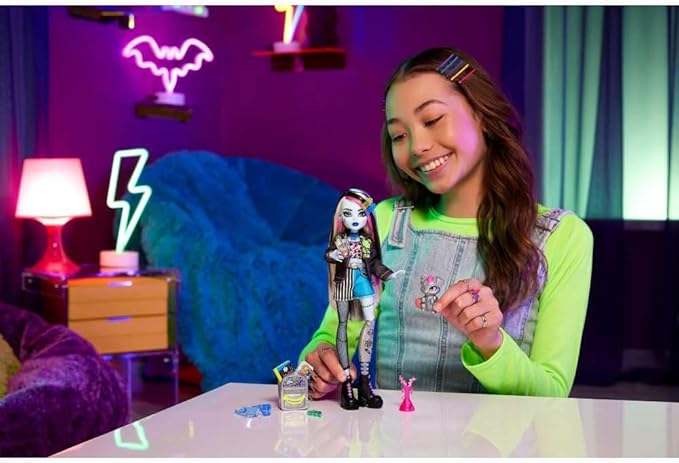 Monster High Frankie Stein Doll in Denim Jacket and Shorts, Includes Pet Dog Watzie and Accessories Like a Backpack, Snack and Notebook