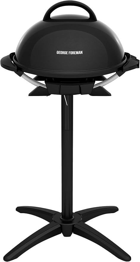 George Foreman Indoor/Outdoor Electric Grill with Stand, 15-Serving | 15-serving electric grill with removable stand, 5 heat settings and fat-removing slope for healthier grilling.