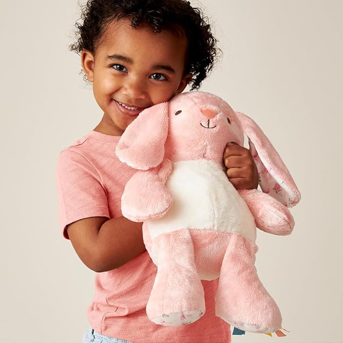 Itzy Ritzy Snuggles Plush Toy – Soft Stuffed Animal for Babies, Kids & Adults – Sensory Ribbons & Textured Fabrics for Tactile Play – Cozy & Cuddly Companion for Newborns & Up (Pink Bunny)