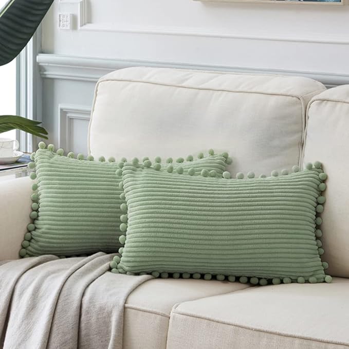 Fancy Homi 2 Pack Sage Green Lumbar Decorative Throw Pillow Covers 14x24 Inch with Pom-poms for Couch Bedroom Sofa, Farmhouse Boho Home Decor, Soft Corduroy Solid Rectangle Cushion Case 35x60 cm