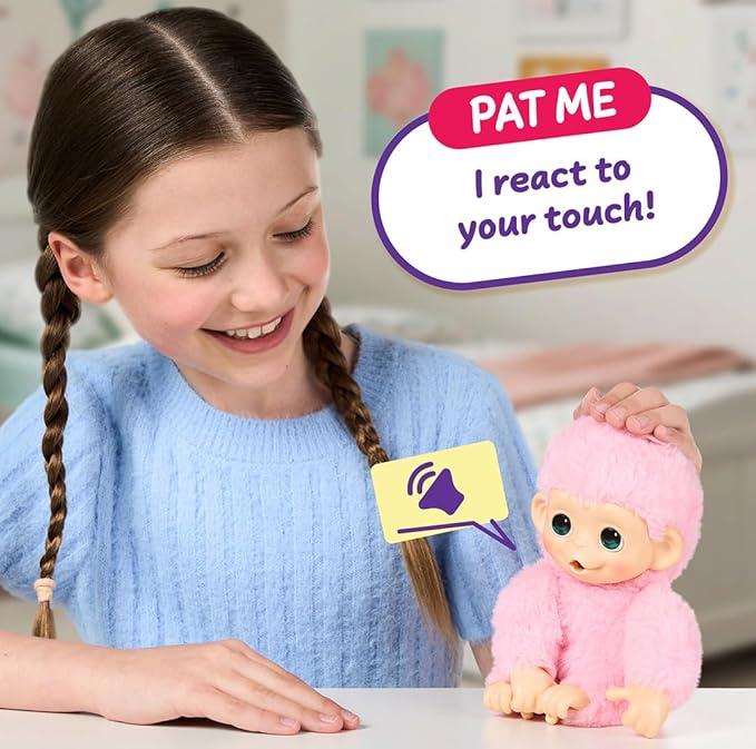 Little Live Pets Baby Monkey Minis – Luna Lemon. Interactive Pet Toy. 20+ Sounds & Reactions. Soft Pink Fur. 7.4" Tall. Feed, Nurture. React. Grippy Hands & Feet. Collect All 3
