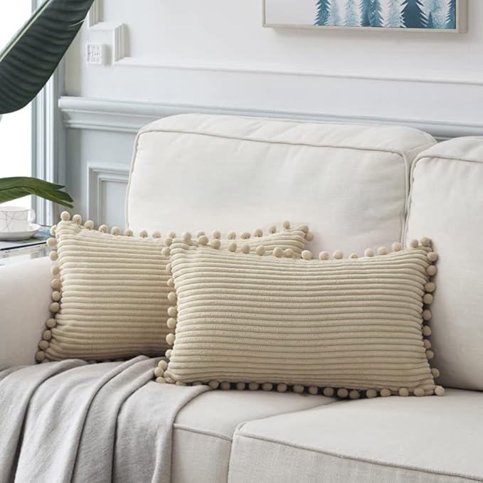 Fancy Homi Pack of 2 Tan Lumbar Decorative Throw Pillow Covers with Pom-poms, Soft Corduroy Solid Rectangle Cushion Cases Set for Couch Sofa Bedroom Car Living Room (12x20 Inch/30x50 cm, Beige)