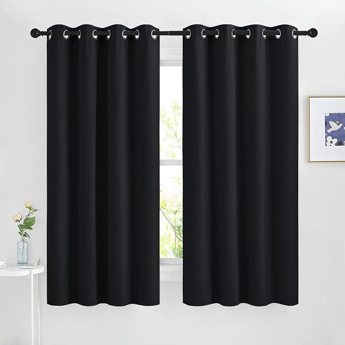 NICETOWN Black Curtains for Boys Room - Blackout Thermal Insulated Window Treatment Solid Grommet Room Darkening for Bedroom/Night Shift (Set of 2, W46 x L63)