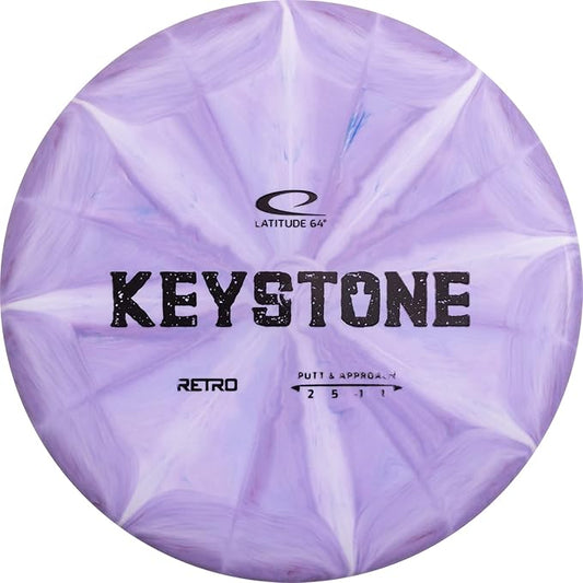 Latitude 64 Retro Burst Keystone Disc Golf Putter, Interactive Family Outdoor Games, Men and Women Frisbee Golf Putt & Approach Disc, 175g+, Stamp Shade of Disc Color & Burst Pattern May Vary