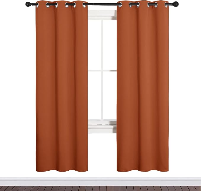 NICETOWN Blackout Curtain Panels for Girls Room, Nursery Essential Thermal Insulated Solid Grommet Top Blackout Drapes (Burnt Orange, 1 Pair, 34 x 72 inches)