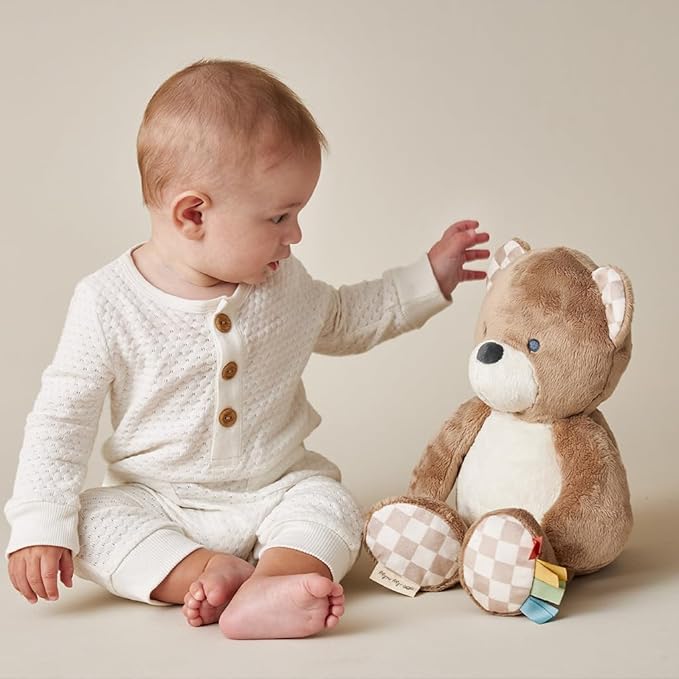 Itzy Ritzy Snuggles Plush Toy – Soft Stuffed Animal for Babies, Kids & Adults – Sensory Ribbons & Textured Fabrics for Tactile Play – Cozy & Cuddly Companion for Newborns & Up (Bear)