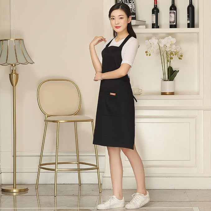 NEWGEM 100% Cotton Cross Back Apron for Women with 2 Pockets - Adjustable Button Straps Pinafore, No Neck Pain Kitchen Chef Apron for BBQ Grilling, Professional Stylist (Black)