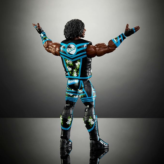 Mattel WWE Elite Action Figure & Accessories, 6-inch Collectible Xavier Woods with 25 Articulation Points, Life-Like Look & Swappable Hands