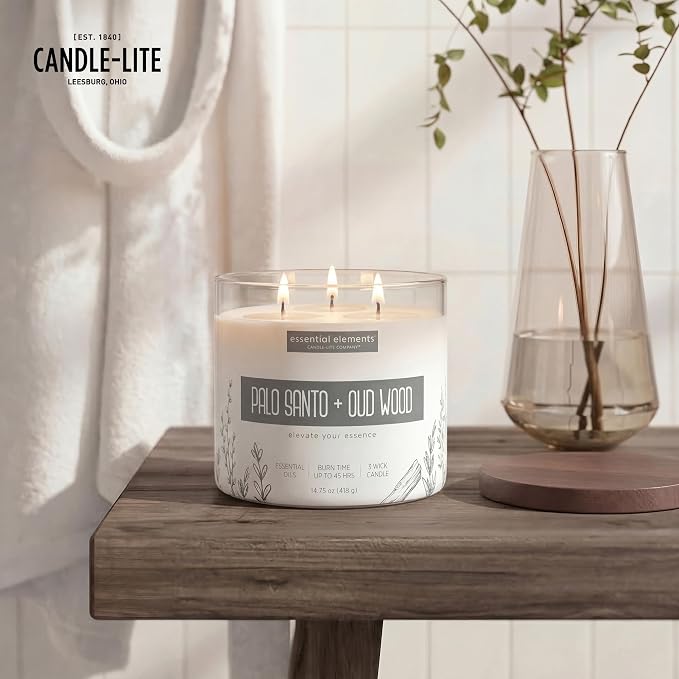 Candle-lite Essential Elements Scented Candles, Palo Santo & Oud Wood, 14.75 oz Jar, Proudly Poured in the USA, Aromatherapy, 3-Wick with 45 Hours of BurnTime, Perfect for Creating a Relaxing Ambiance