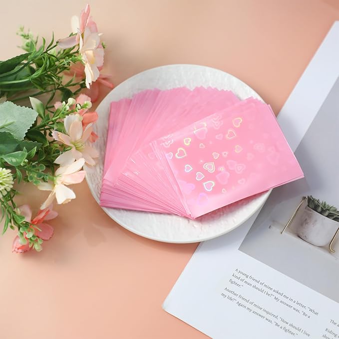 100pcs Holographic Colors Card Sleeves, 3.58x2.6in/91x66mm Colored Heart-Shaped Flashing Card Sleeves for Mini Polaroid Photocard Collectible Protection(Pink)