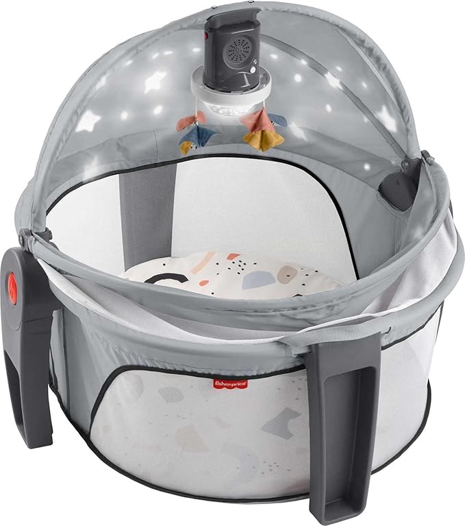 Fisher-Price Portable Baby Bassinet and Play Space Deluxe On-the-Go Projection Dome with Lights Music and Canopy, Paper Shapes