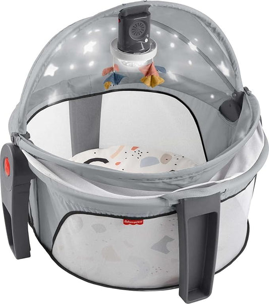 Fisher-Price Portable Baby Bassinet and Play Space Deluxe On-the-Go Projection Dome with Lights Music and Canopy, Paper Shapes