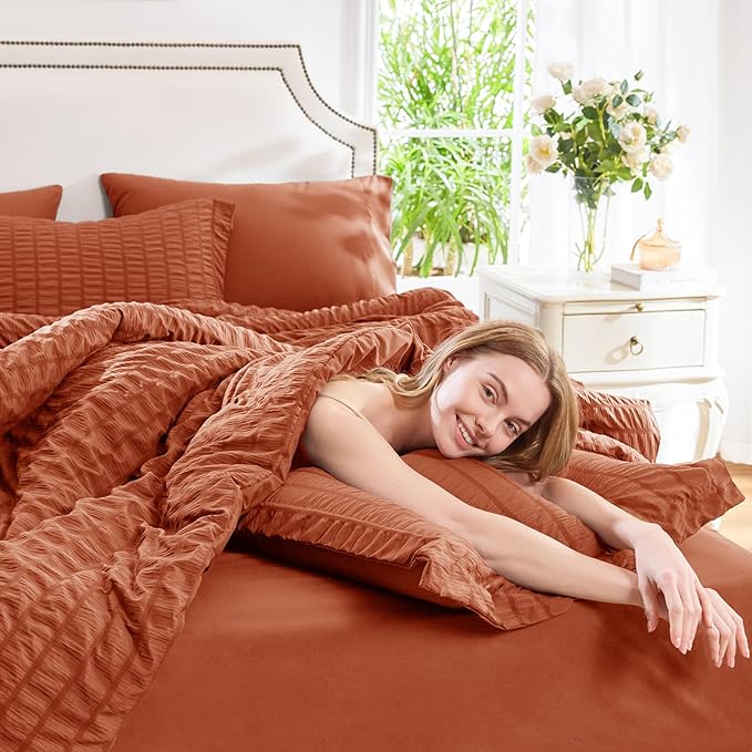 CozyLux Oversized King Comforter Set Burnt Orange Seersucker 7 Pieces 120x98 Bed in a Bag Comforter Set with Sheets, Terracotta Bedding Set with Down Alternative Comforter, Sheets, Pillowcases & Shams