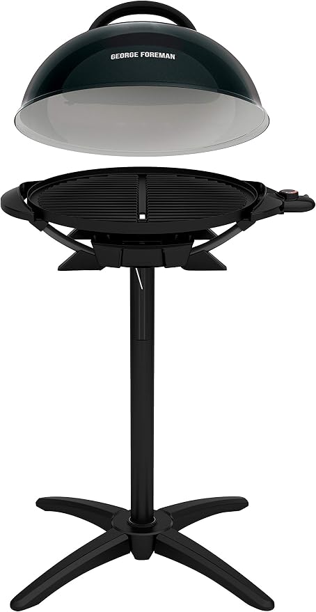 George Foreman Indoor/Outdoor Electric Grill with Stand, 15-Serving | 15-serving electric grill with removable stand, 5 heat settings and fat-removing slope for healthier grilling.