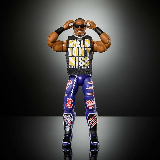 Mattel WWE Elite Action Figure & Accessories, Series #121, 6-inch Collectible Carmelo Hayes with 25 Articulation Points & Swappable Hands