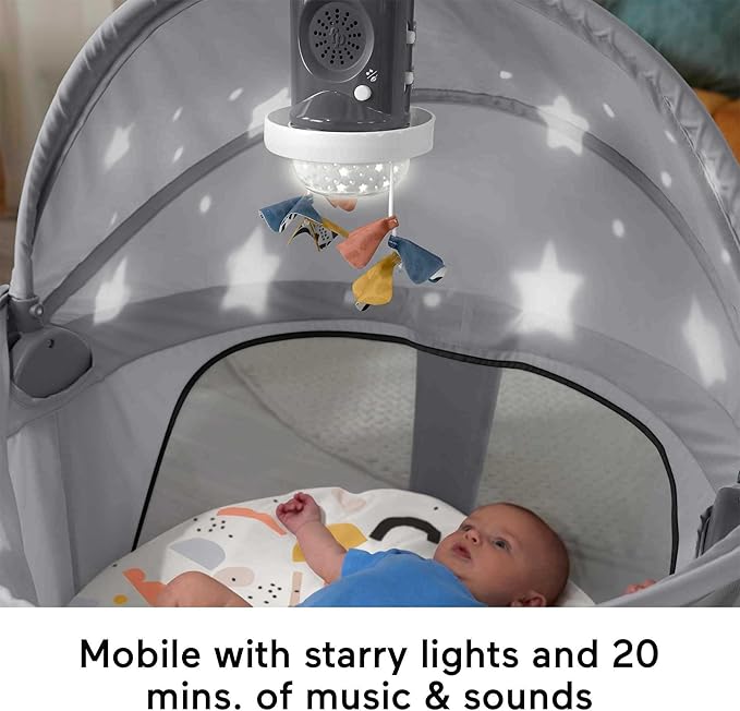 Fisher-Price Portable Baby Bassinet and Play Space Deluxe On-the-Go Projection Dome with Lights Music and Canopy, Paper Shapes