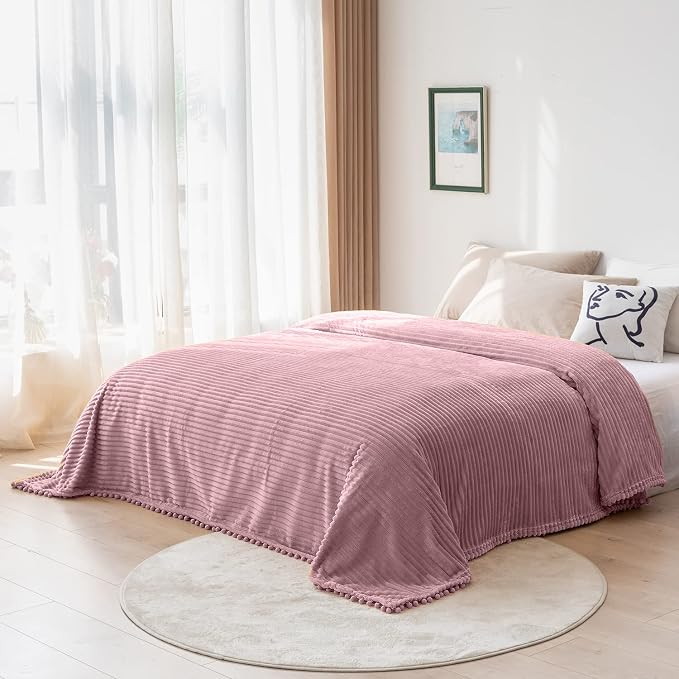 DISSA Fleece Blanket Twin Size – 60x80, Pink - Soft, Plush, Fluffy, Fuzzy, Warm, Cozy – Perfect Throw for Couch, Bed, Sofa - with Pompom Fringe - Flannel Blanket