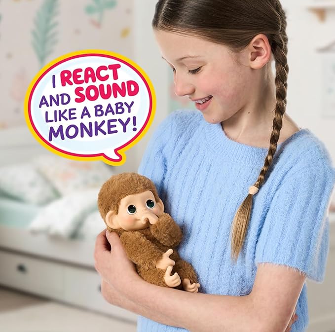 Little Live Pets Baby Monkey Minis – Pepi Peach. Interactive Pet Toy. 20+ Sounds & Reactions. Soft Brown Fur, 7.4" Tall. Super Realistic. Feed, Nurture, React. Grippy Hands & Feet. Collect All 3