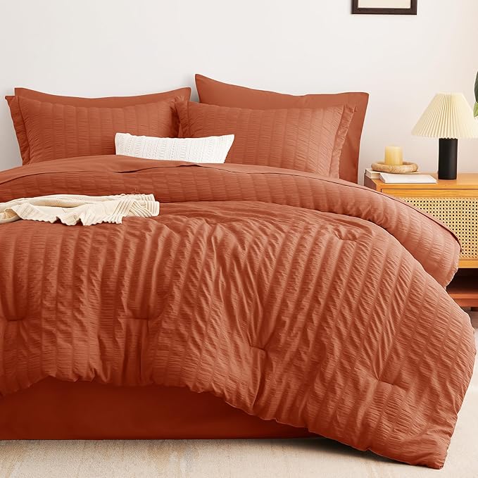 CozyLux Oversized King Comforter Set Burnt Orange Seersucker 7 Pieces 120x98 Bed in a Bag Comforter Set with Sheets, Terracotta Bedding Set with Down Alternative Comforter, Sheets, Pillowcases & Shams