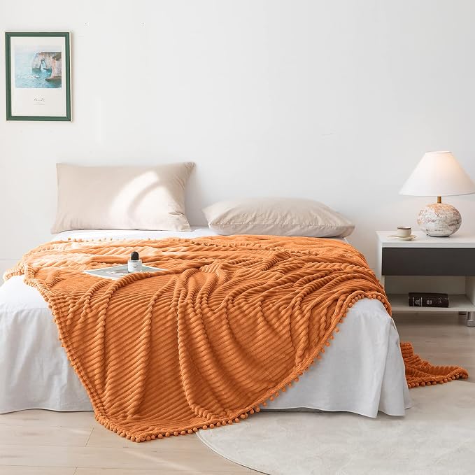 DISSA Fleece Blanket Twin Size – 60x80, Orange – Soft, Plush, Fluffy, Fuzzy, Warm, Cozy – Perfect Throw for Couch, Bed, Sofa - with Pompom Fringe - Flannel Blanket Throw Blanket