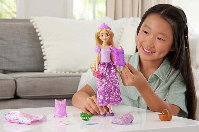 Mattel Disney Princess Toys, Rapunzel Fashion Doll with 2 Looks, 9 Accessories, 2 Snap-On Bodices & 2 Skirts, 2-in-1 Stories Inspired by Disney Tangled