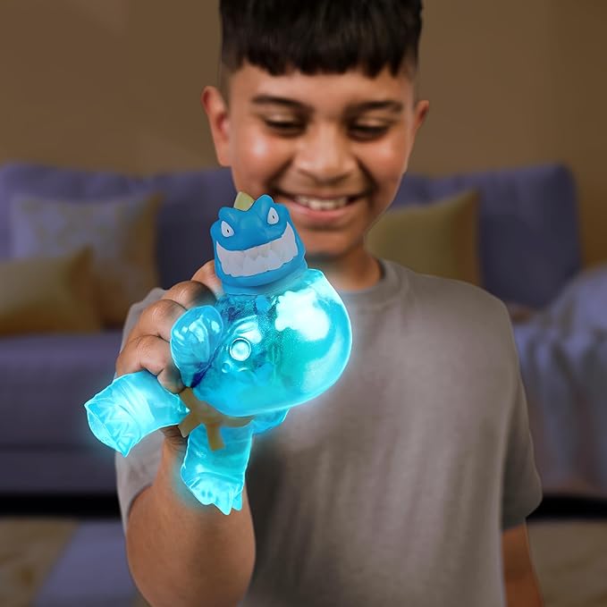 Heroes of Goo Jit Zu Hero Creator with 3 Unique Goo Fillings, Mix, Fill & Create Your Own Stretchy Glow-in-The-Dark Tyro Action Figure, Play Again and Again
