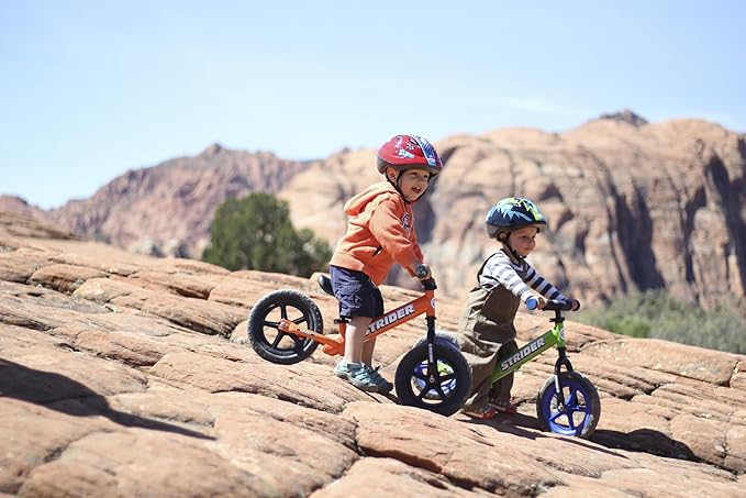 Strider 12” Sport Bike - No Pedal Balance Bicycle for Kids 1 to 4 Years - Includes Safety Pad, Padded Seat, Mini Grips & Flat-Free Tires - Tool-Free Assembly & Adjustments
