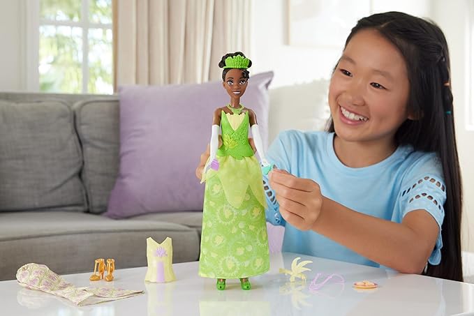 Mattel Disney Princess Toys, Tiana Fashion Doll with 2 Looks, 9 Accessories, 2 Snap-On Bodices & 2 Skirts, 2-in-1 Stories Inspired by Disney Movie