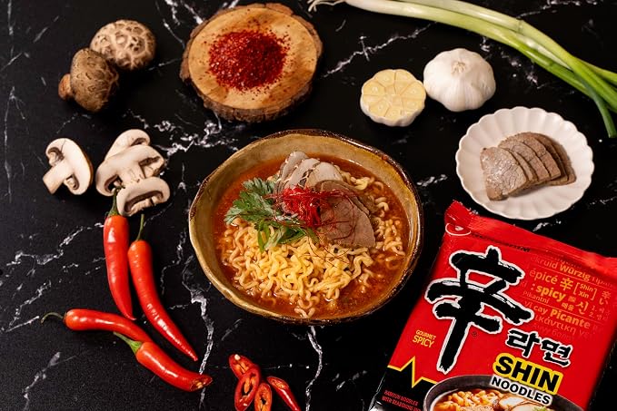 Nongshim Shin Ramyun Noodles, Spicy Korean Signature Instant Ramyun, Rich Beef Flavored Broth, Microwaveable, Korean Instant Noodles, 4.23 oz (Pack of 16), Packaging May Vary