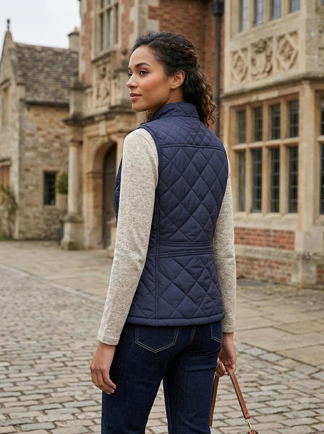 Fuinloth Women's Quilted Vest Lightweight Puffer Stand Collar Zip Gilet | 4 pockets with 2 inner storage. Quilted padded warm gilet. Fall winter outerwear layering vest for travel hiking daily wear.