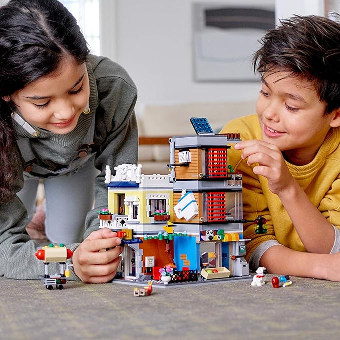 LEGO Creator 3 in 1 Townhouse Pet Shop & Café 31097 Toy Store Building Set with Bank, Town Playset with a Toy Tram, Animal Figures and Minifigures (969 Pieces)