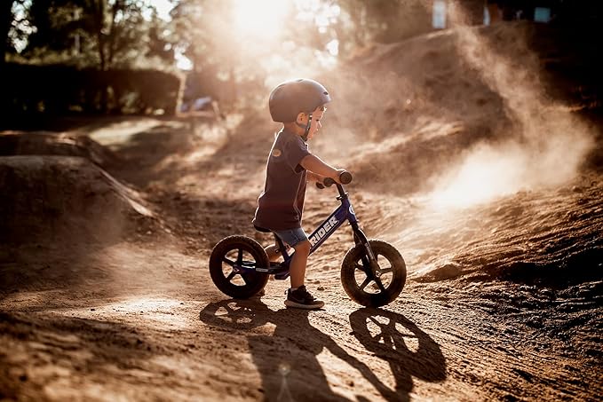 Strider 12” Sport Bike - No Pedal Balance Bicycle for Kids 1 to 4 Years - Includes Safety Pad, Padded Seat, Mini Grips & Flat-Free Tires - Tool-Free Assembly & Adjustments