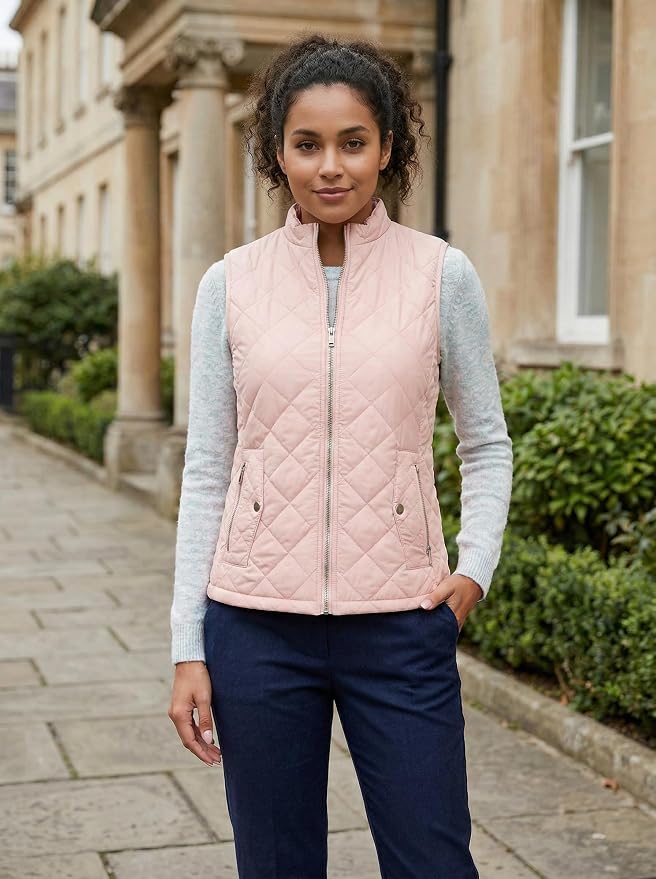 Fuinloth Women's Quilted Vest Lightweight Puffer Stand Collar Zip Gilet | 4 pockets with 2 inner storage. Quilted padded warm gilet. Fall winter outerwear layering vest for travel hiking daily wear.