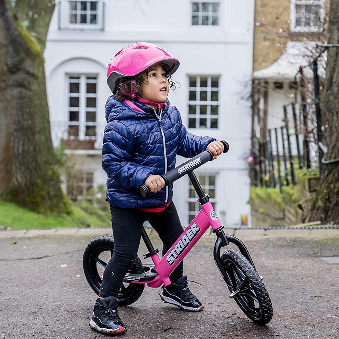 Strider 12” Sport Bike - No Pedal Balance Bicycle for Kids 1 to 4 Years - Includes Safety Pad, Padded Seat, Mini Grips & Flat-Free Tires - Tool-Free Assembly & Adjustments