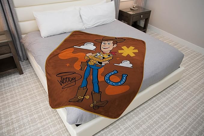 Jay Franco Plush Throw Blanket – 46" x 60" Inches Kids Hero Soft & Cozy Fleece Throw for Bedroom & Couch Décor, Official Licensed Product, Brown - Toy Story Woody