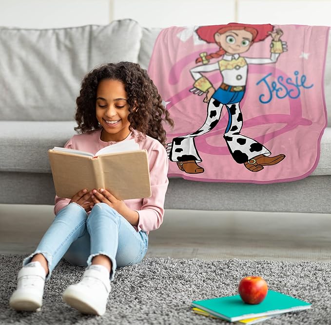 Jay Franco Plush Throw Blanket – 46" x 60" Inches Kids Hero Soft & Cozy Fleece Throw for Bedroom & Couch Décor, Official Licensed Product, Pink - Toy Story Jessie