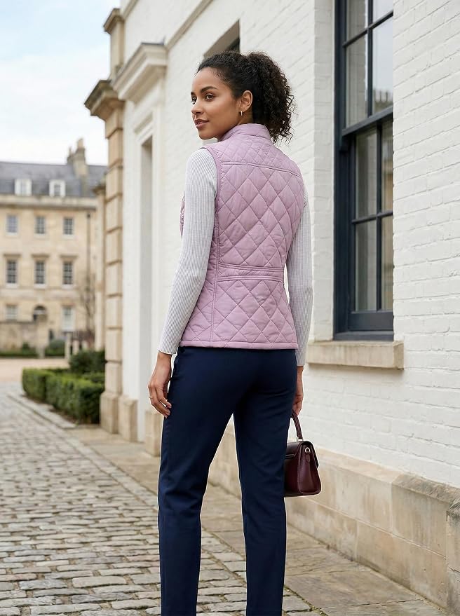 Fuinloth Women's Quilted Vest Lightweight Puffer Stand Collar Zip Gilet | 4 pockets with 2 inner storage. Quilted padded warm gilet. Fall winter outerwear layering vest for travel hiking daily wear.