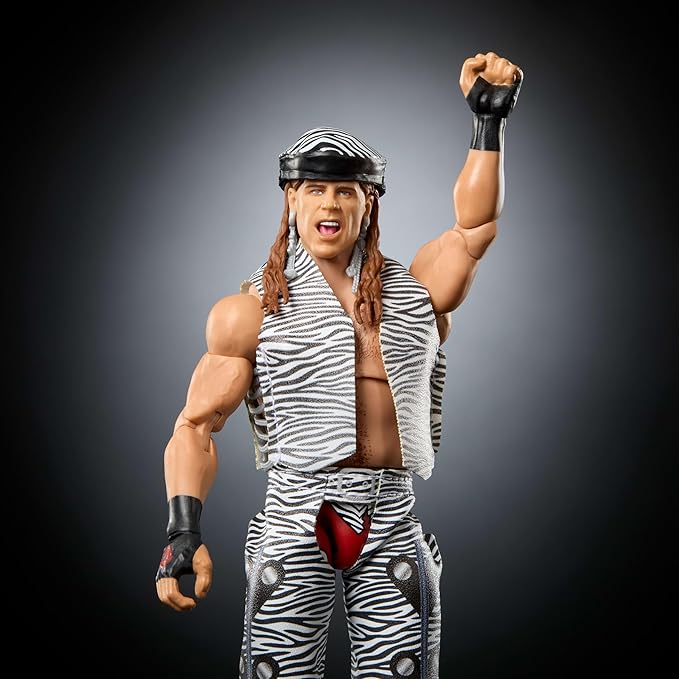 Mattel WWE Ultimate Edition Action Figure & Accessories Set, Shawn Michaels 6-inch Collectible with Swappable Heads & Hands, 30 Articulation Points (Amazon Exclusive)