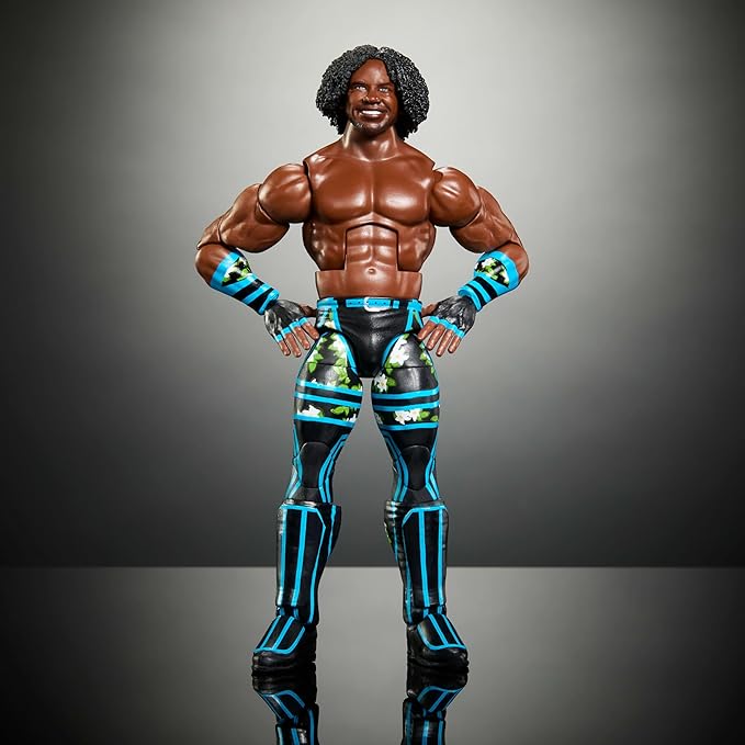 Mattel WWE Elite Action Figure & Accessories, 6-inch Collectible Xavier Woods with 25 Articulation Points, Life-Like Look & Swappable Hands