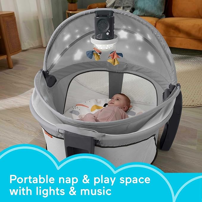 Fisher-Price Portable Baby Bassinet and Play Space Deluxe On-the-Go Projection Dome with Lights Music and Canopy, Paper Shapes