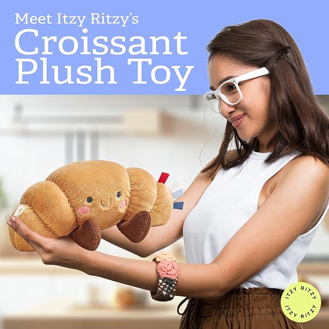 Itzy Ritzy Snuggles Plush Toy – Soft Stuffed Animal for Babies, Kids & Adults – Sensory Ribbons & Textured Fabrics for Tactile Play – Cozy & Cuddly Companion for Newborns & Up (Croissant)