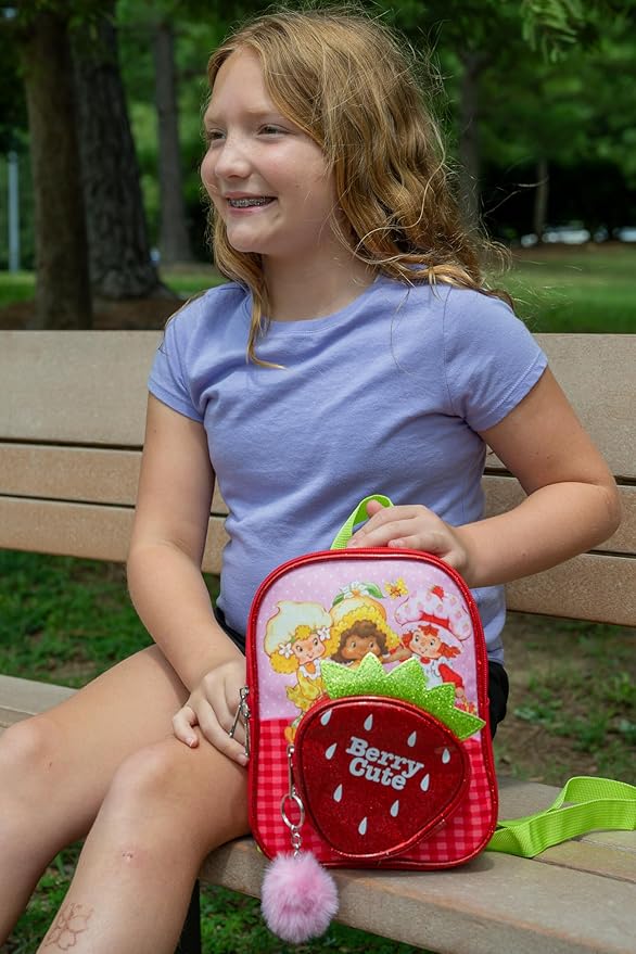 AI ACCESSORY INNOVATIONS Strawberry Shortcake 9” Micro Mini Backpack Purse Featuring Glitter PU, Diecut Strawberry Pocket & Pompom Dangle, Red