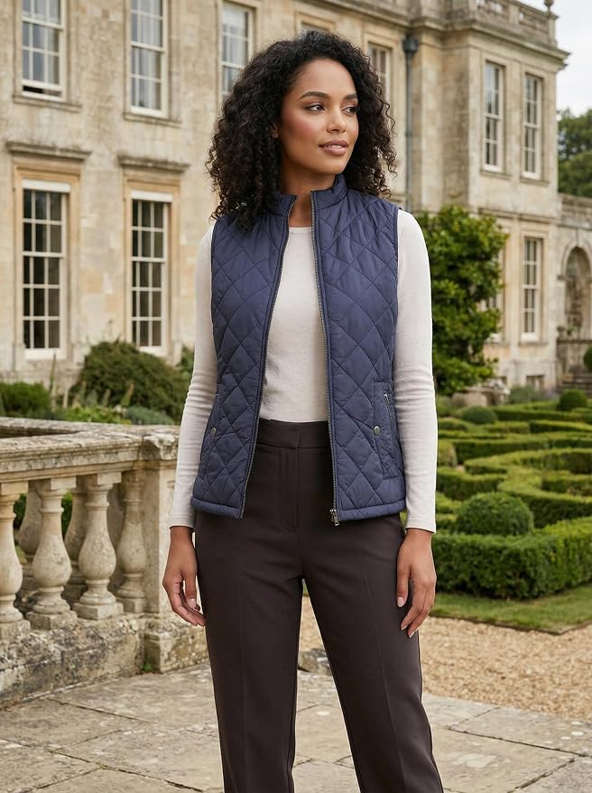 Fuinloth Women's Quilted Vest Lightweight Puffer Stand Collar Zip Gilet | 4 pockets with 2 inner storage. Quilted padded warm gilet. Fall winter outerwear layering vest for travel hiking daily wear.