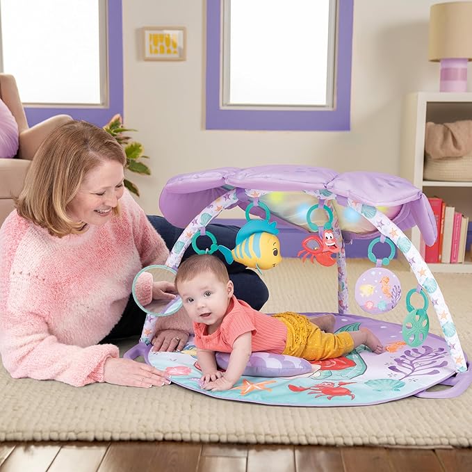 Bright Starts Disney Baby The Little Mermaid Twinkle Trove Light-Up Musical Baby Activity Gym with Tummy Time Pillow, Newborn+