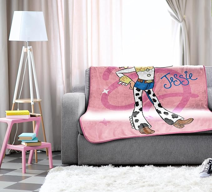 Jay Franco Plush Throw Blanket – 46" x 60" Inches Kids Hero Soft & Cozy Fleece Throw for Bedroom & Couch Décor, Official Licensed Product, Pink - Toy Story Jessie