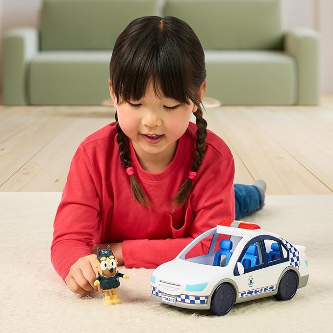 Bluey Police Car, Vehicle from The Special Episode The Sign. Includes Police Car with Flashing Lights & Sounds, Policeman Figure, and Themed Sticker Set. Batteries Included.