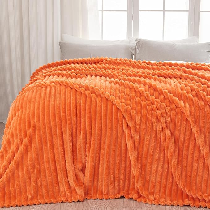 NEWCOSPLAY Super Soft Fall Throw Blanket Orange Premium Silky Flannel Fleece 3D Ribbed Jacquard Lightweight Bed Blanket All Season Use (Orange Ribbed, Throw(50"x60"))