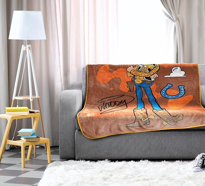Jay Franco Plush Throw Blanket – 46" x 60" Inches Kids Hero Soft & Cozy Fleece Throw for Bedroom & Couch Décor, Official Licensed Product, Brown - Toy Story Woody