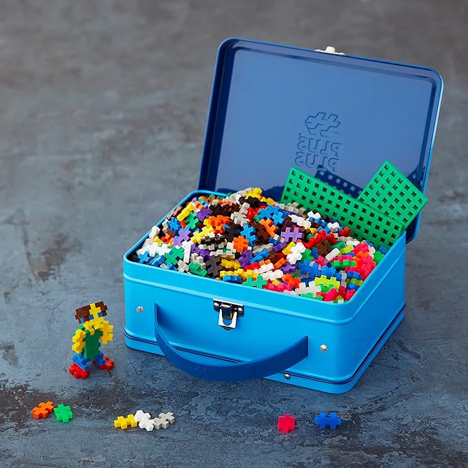 PLUS PLUS Building Set with Metal Suitcase, 3D Open Ended Stem Toy for Kids, 600 Mini Interlocking Pieces, 2 Green Baseplates
